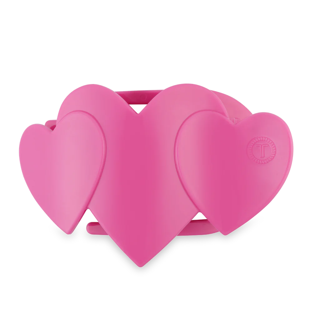 pink flat hair clip in the shape of 3 hearts side by side
