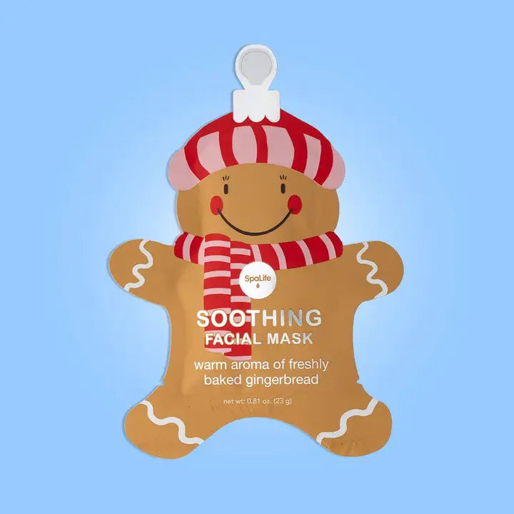 Gingerbread man-shaped soothing facial mask with a blue background