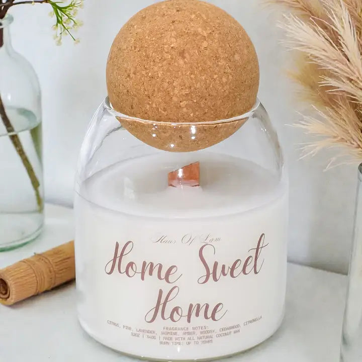 White glass candle with wooden wick and round cork topper