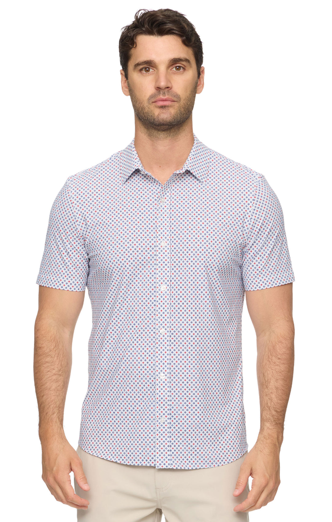 Man wearing a patterned short-sleeve shirt on a white background