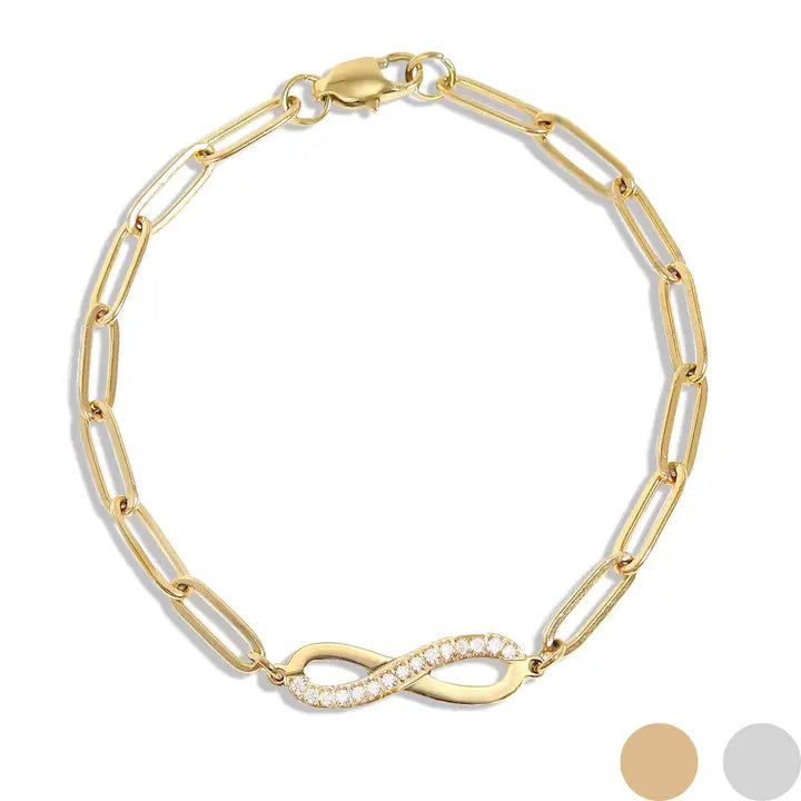 Gold bracelet with infinity design on a white background