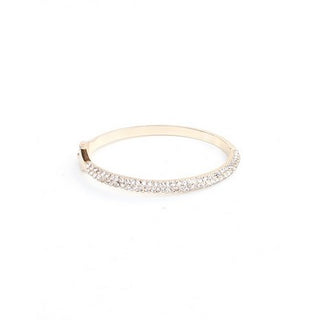 Gold bracelet with small diamonds on a white background