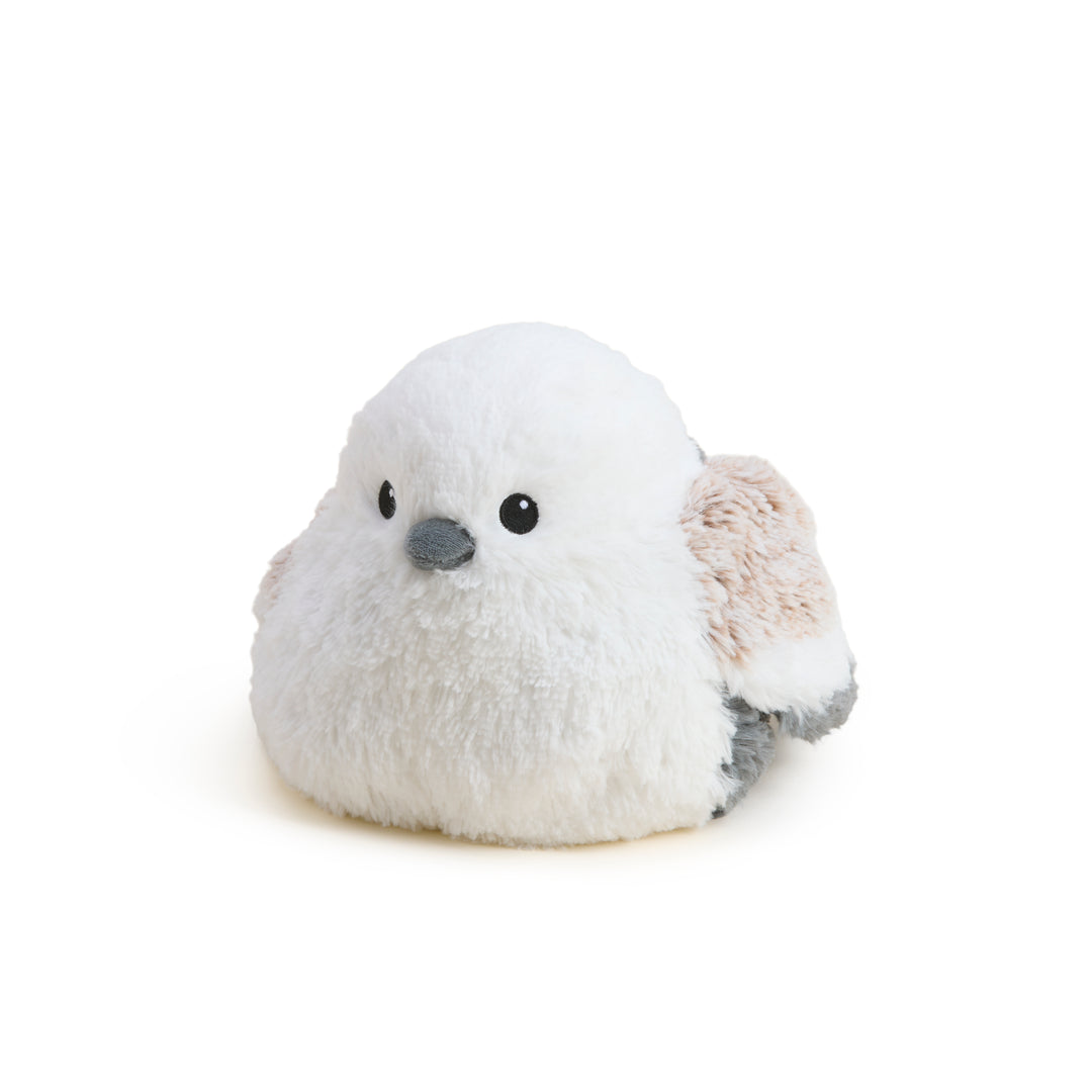 Plush toy bird with white body and brown wing on a white background