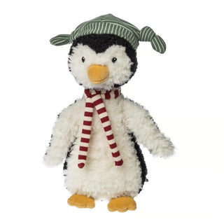 stuffed penguin toy with red and white striped scarf and green and white striped hat