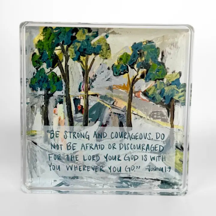 A square clear acrylic block featuring an impressionistic painting of trees and a pathway, with a handwritten Bible verse printed across the front. The block is photographed on a clean white background.