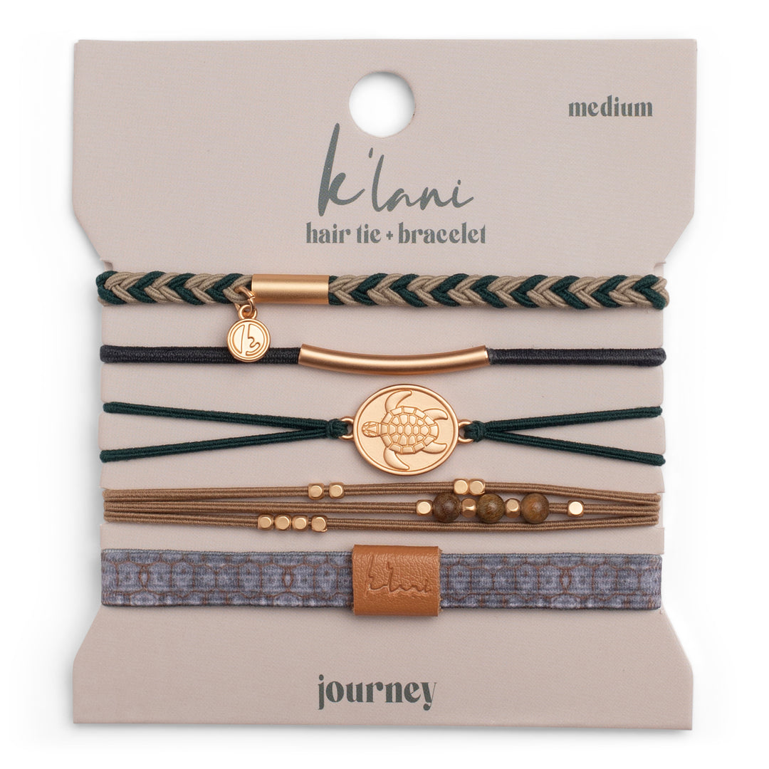 Set of hair ties and bracelets on a &