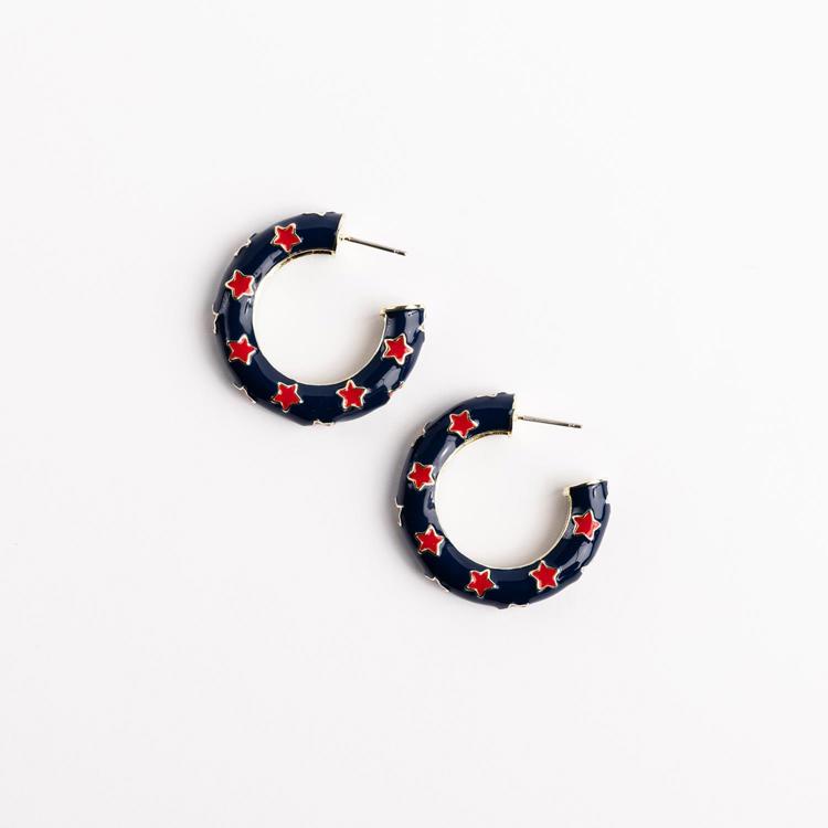 Navy hoop earrings with red star patterns on a white background