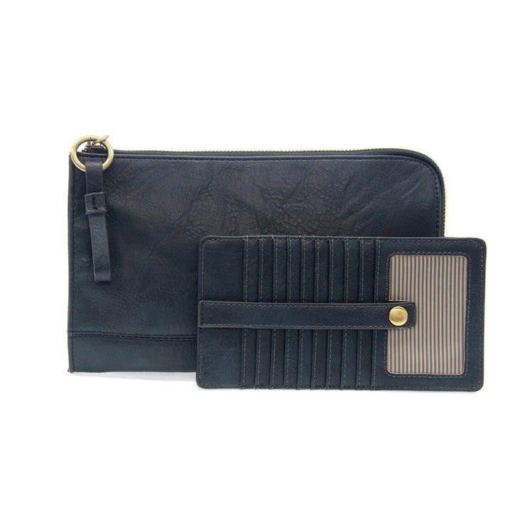 Navy leather clutch and wallet set on a white background