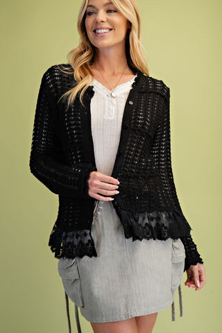 Black knit cardigan with scalloped lace trim