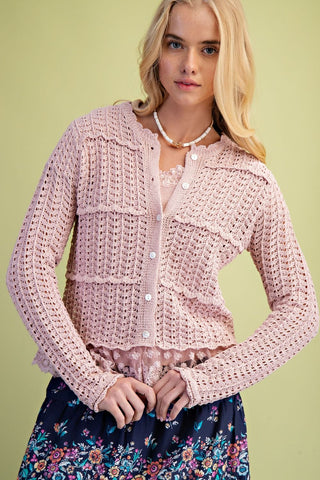 pink knit cardigan with scalloped lace trim