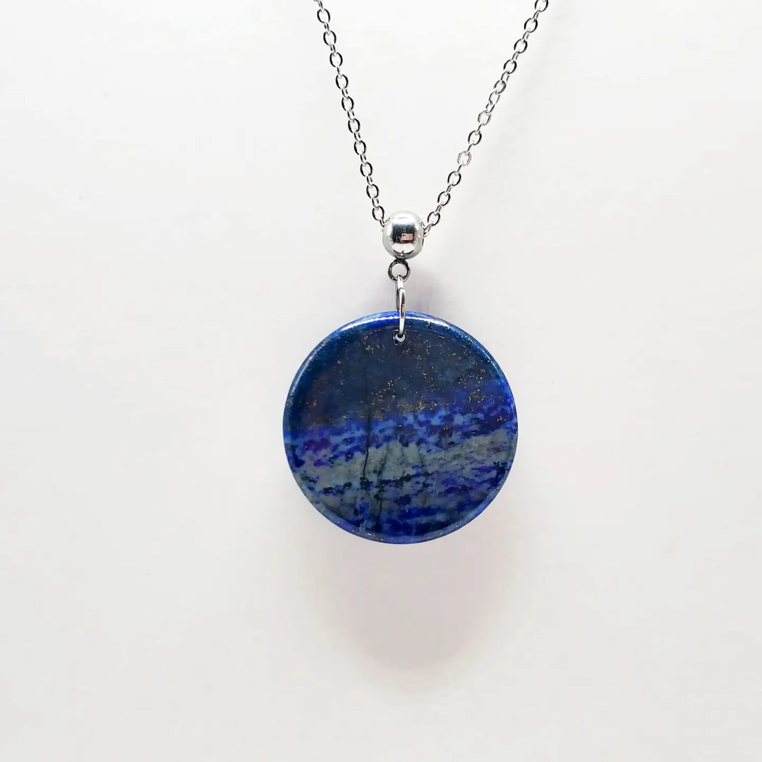 Necklace with a blue pendant on a white background