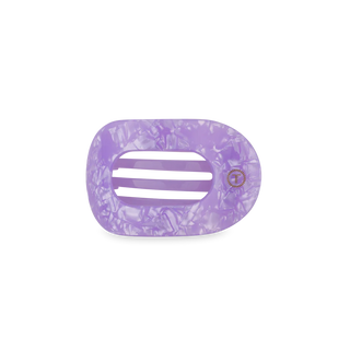 Purple marbled hair clip on a white background