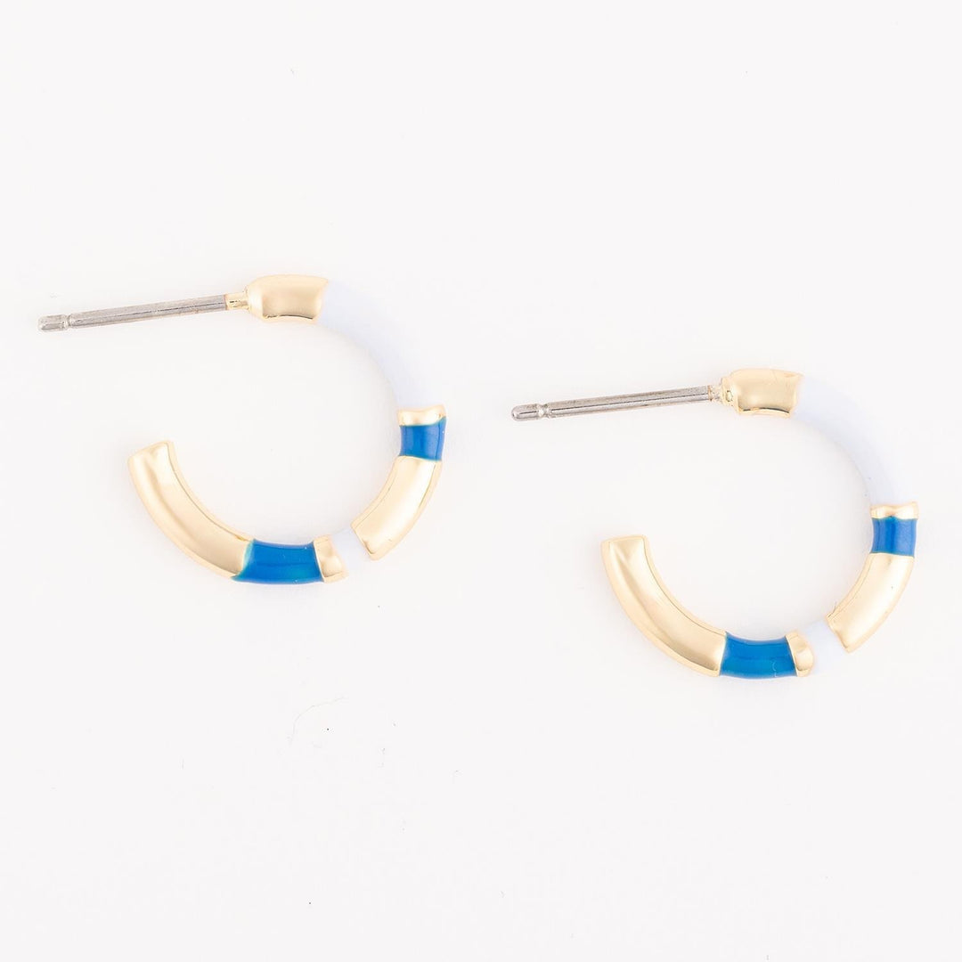 Hoop earrings with gold and blue accents on a white background