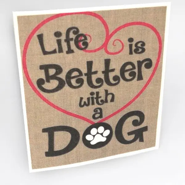 Decorative sign with 'Life is Better with a Dog' text on a textured background