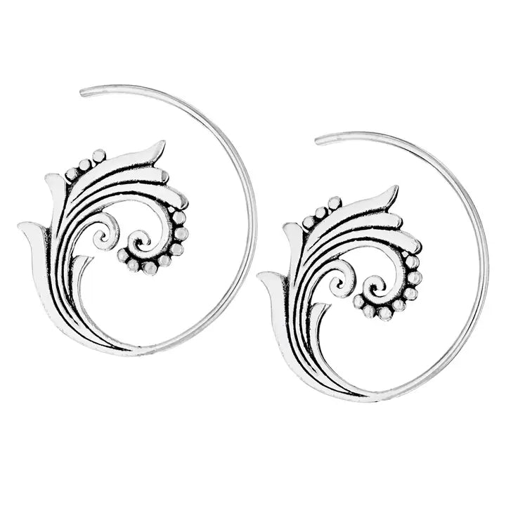 Silver hoop earrings with intricate designs on a white background