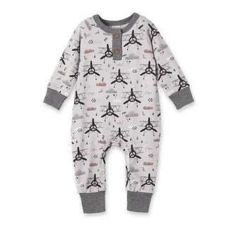 Baby onesie with airplane pattern on a white background