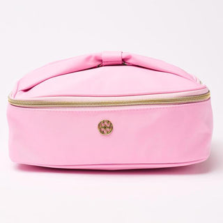 Pink cosmetic bag with gold zipper and logo on a white background