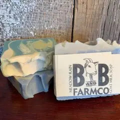 Stack of blue, green, cream color soap bars