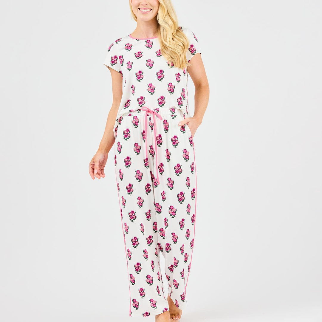 white pajama set with pink flower pattern