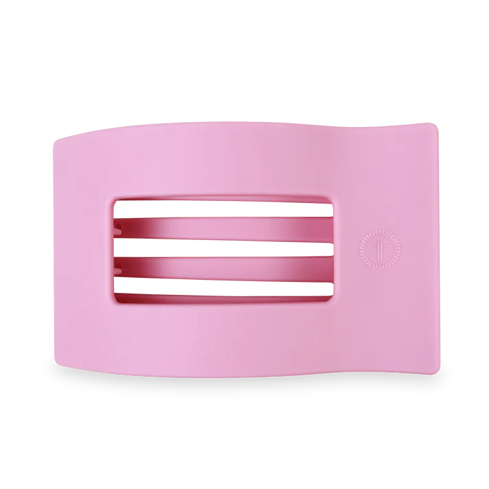 Pink hair clip on a white background
