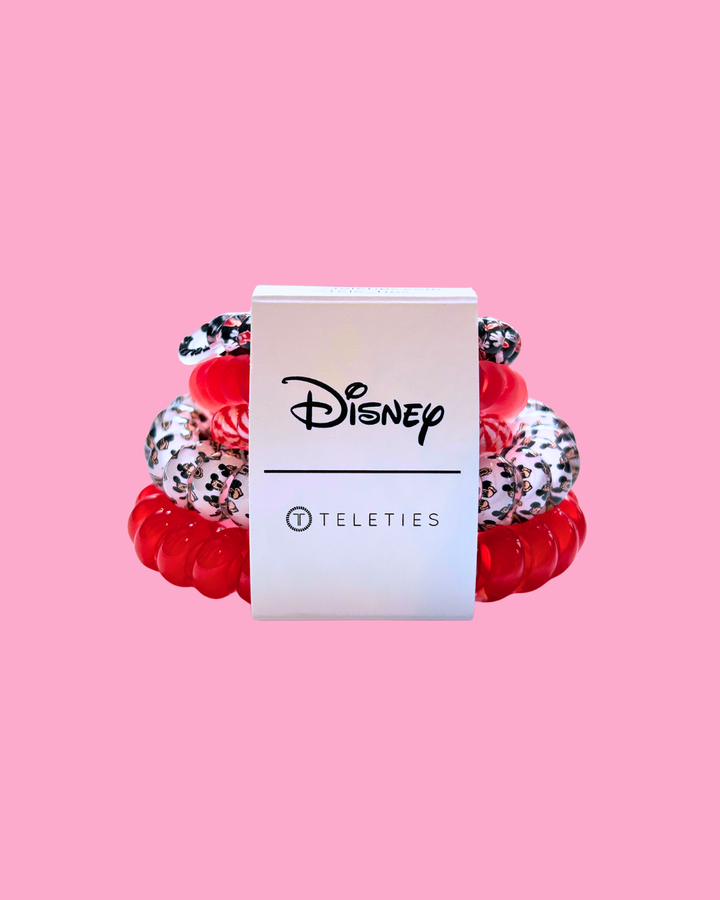 Red and white bracelet with Disney and Teleties branding on a pink background