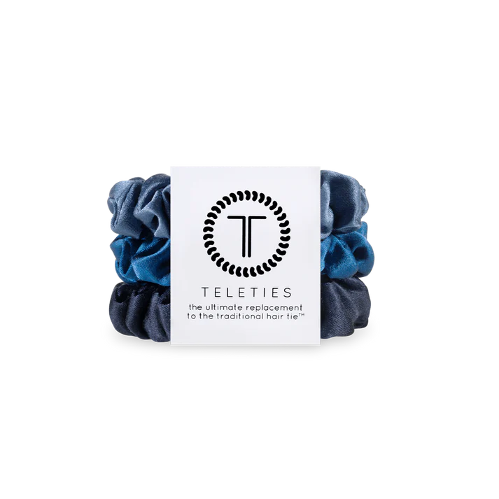 Pack of blue scrunchies with Teleties packaging on a white background