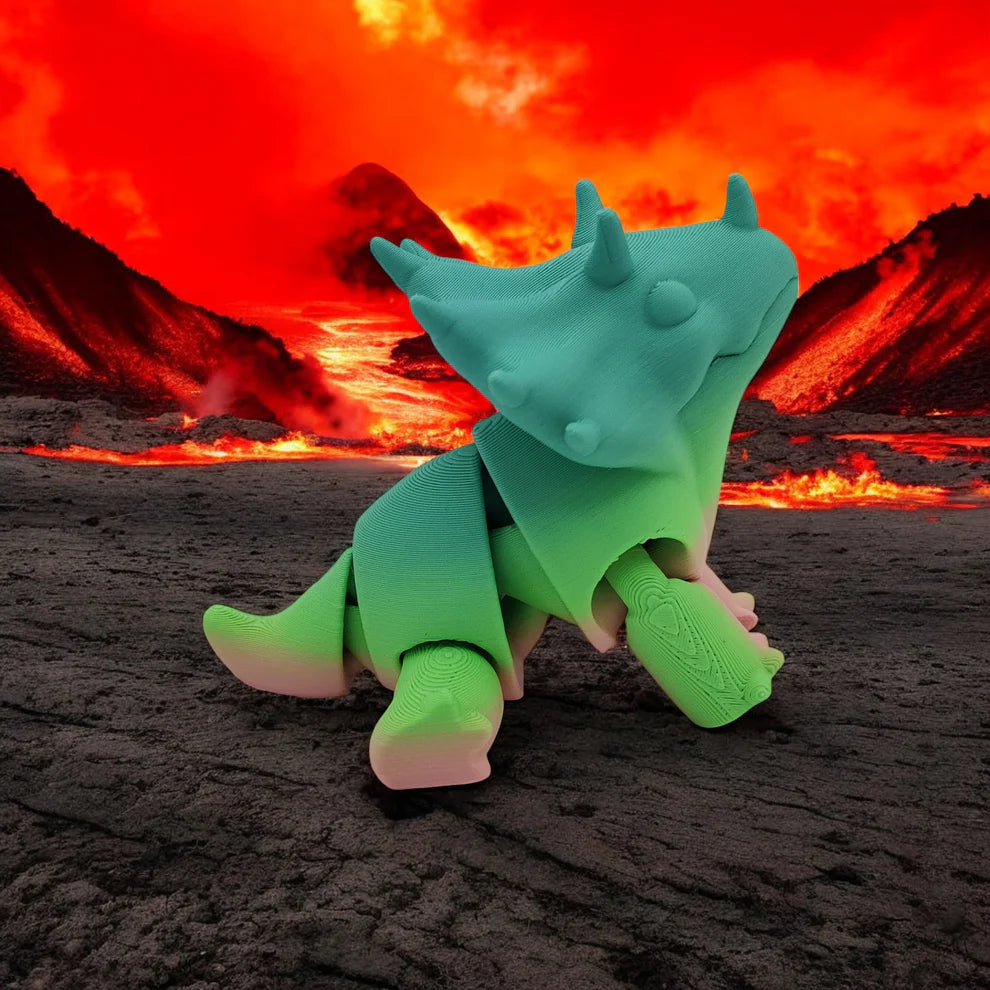 Green dinosaur toy in front of a volcanic eruption
