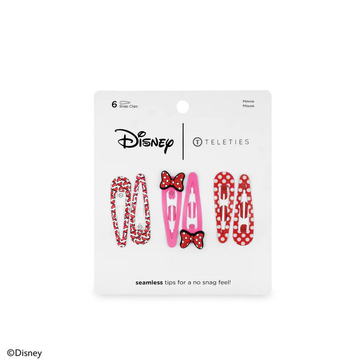 Packaging of Disney hair clips with red and pink designs on a white background