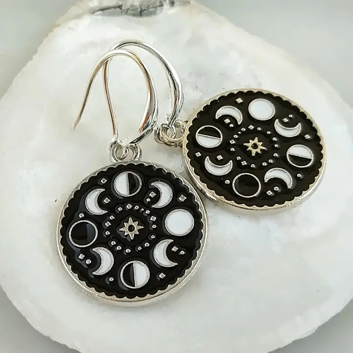 circular earrings with moon phases