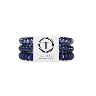 Set of blue hair ties with a Teleties label on a white background