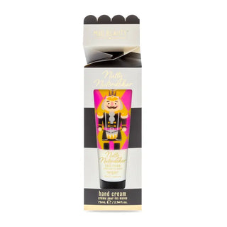 hand lotion with a nutcracker printed on the bottle in a black and white striped gift box
