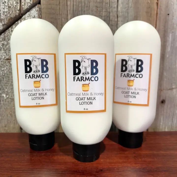 three bottles of goat milk lotion