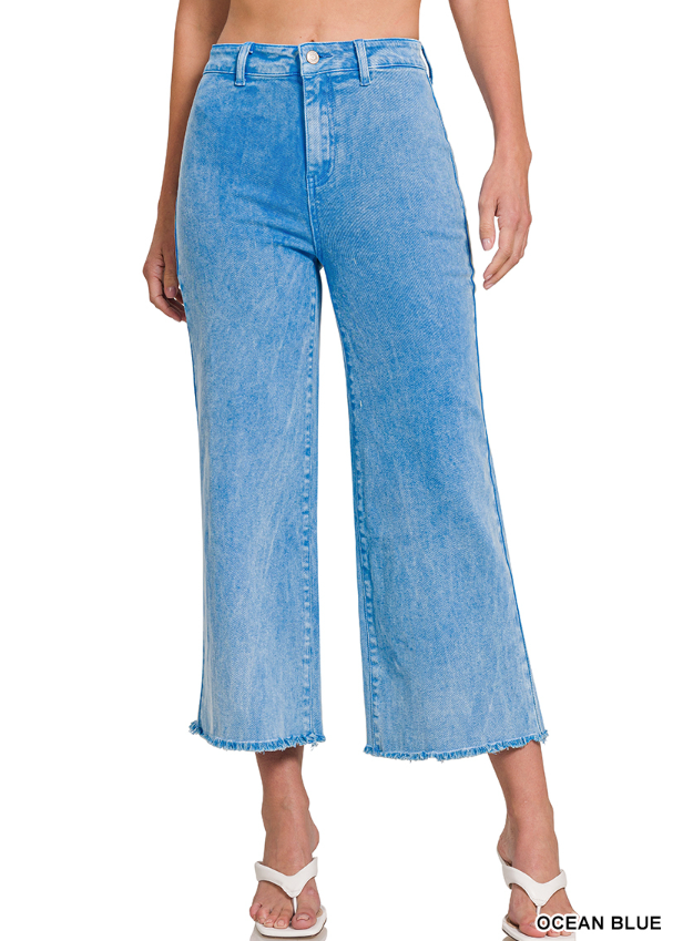 Blue denim jeans on a white background