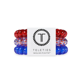 Red and blue hair ties with Teleties logo on a white background