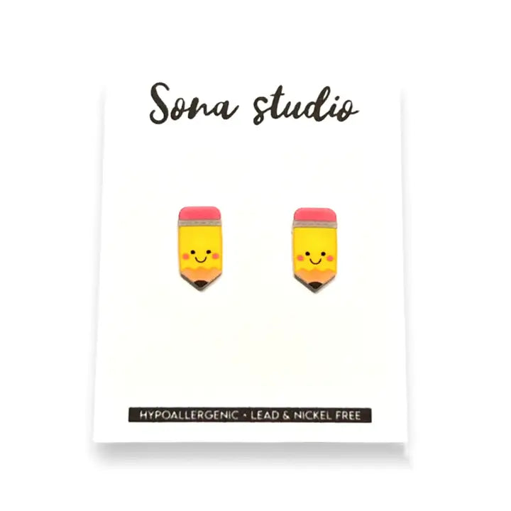 Soma Studio earrings on a white card with product details.
