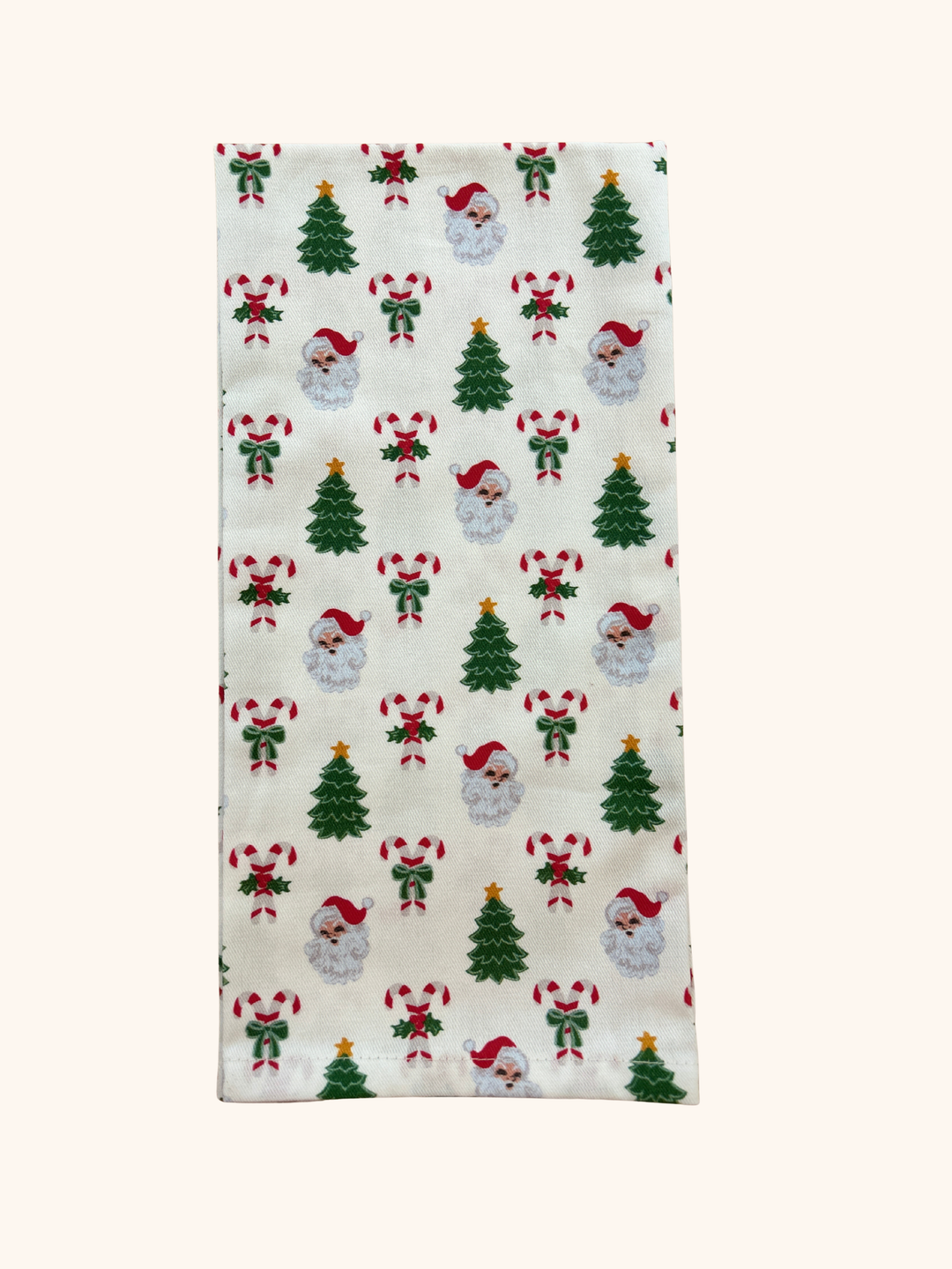 Christmas-themed fabric with Santa Claus, trees, and candy canes on a white background