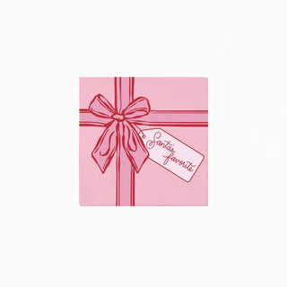pink paper napkin with gift bow and tag reading "santas favorite"
