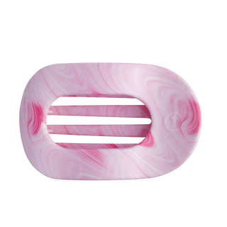Pink and white marbled hair clip on a white background