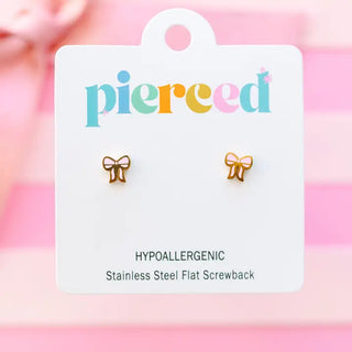 Bow-shaped earrings on a 'pierceed' branded card with a pink gradient background