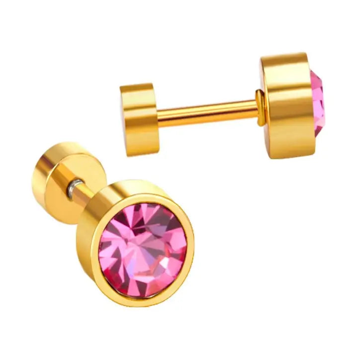Gold earrings with pink gemstones on a white background