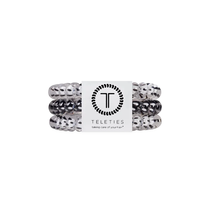 pack of 3 coil hair ties, 2 white with black polka dots, and one black with white polka dots