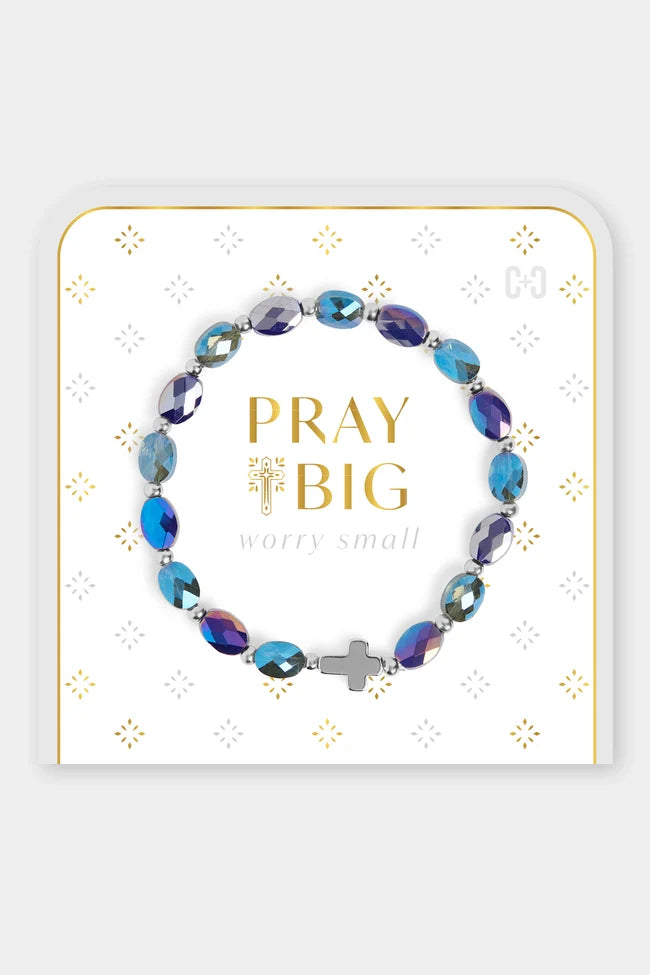 beaded bracelet with blue, purple, and silver beads and a silver cross charm