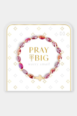 Beaded bracelet with red and gold beads and a gold cross charm