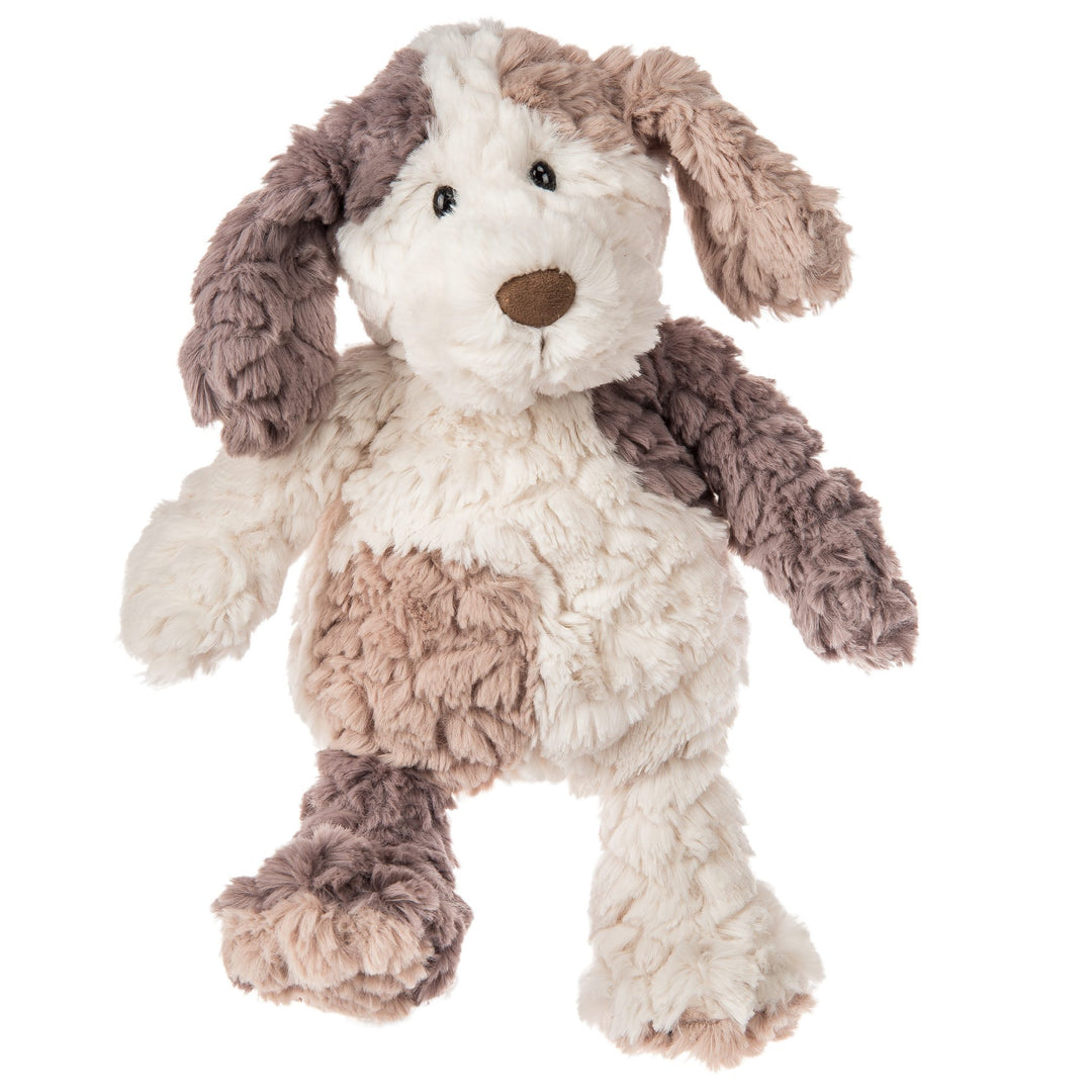 Plush dog toy with brown and beige fur on a white background