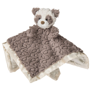 Plush toy with a blanket on a white background