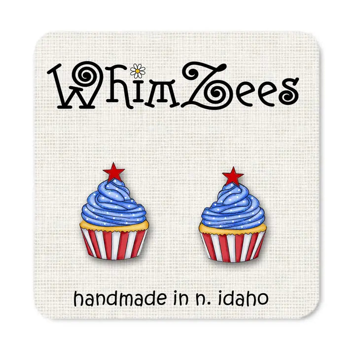Cupcake-shaped earrings with red, white, and blue frosting on a branded card.