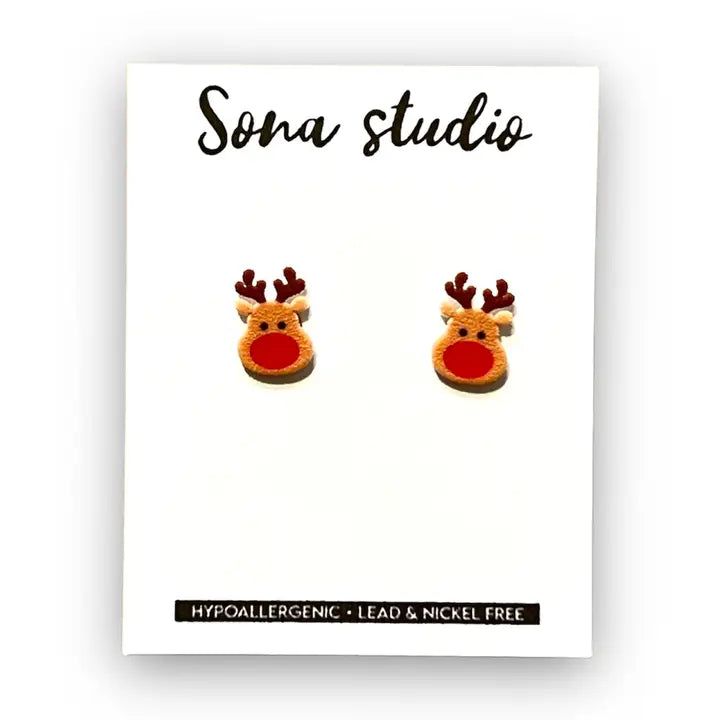 Reindeer-shaped earrings on a card with 'Sona Studio' branding.