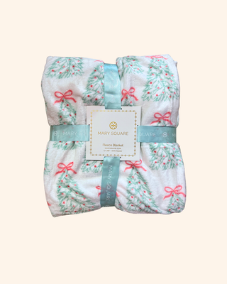 Fleece Blanket, featuring a festive holiday design with delicate greenery and cheerful pink bows
