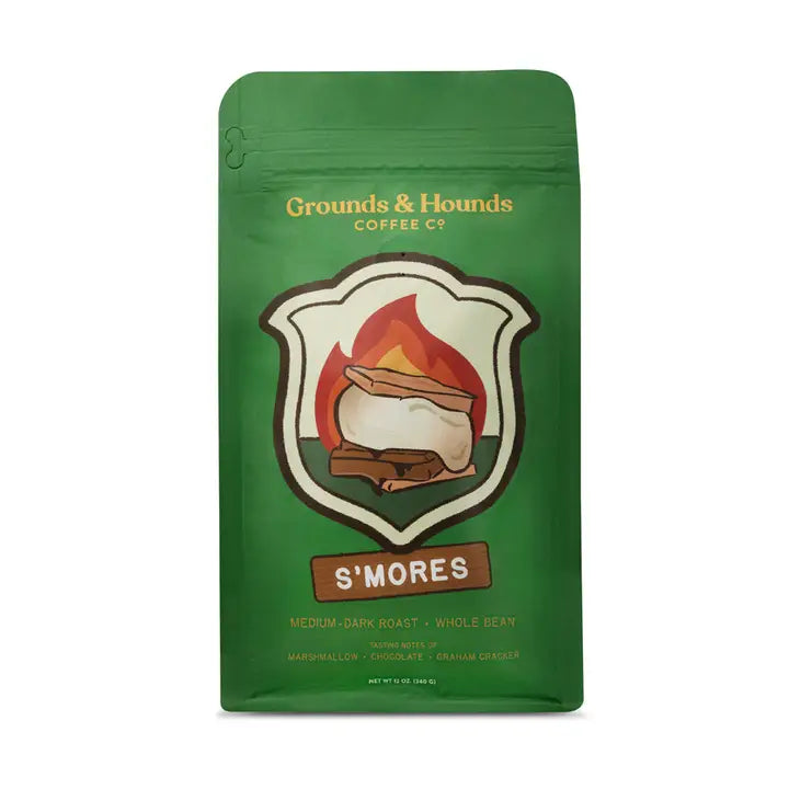A green stand-up coffee bag labeled Grounds &amp; Hounds Coffee Co. S&