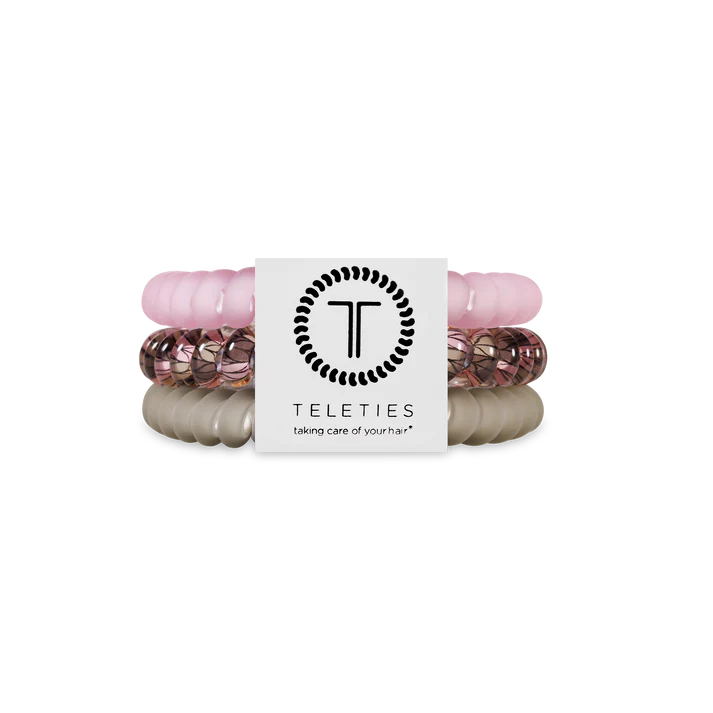Set of hair ties with a Teleties branded card on a white background